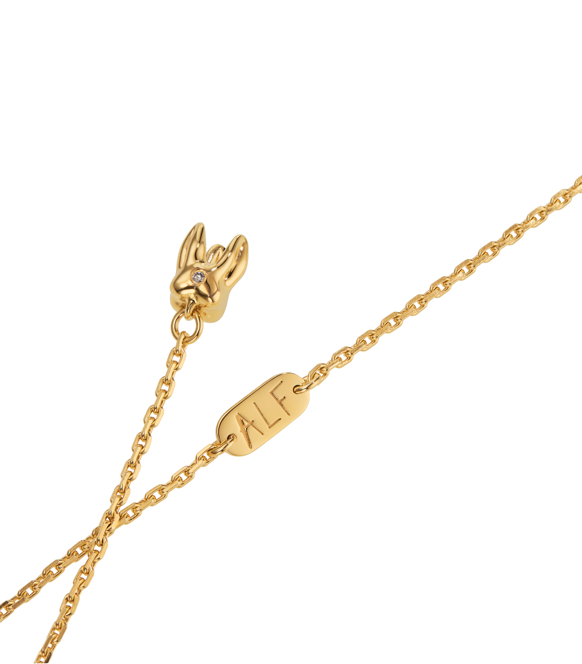 ALF Jewelry Baby Necklace in 18ct gold vermeil with tsavorite eyes and diamond detail, artisanal luxury piece.